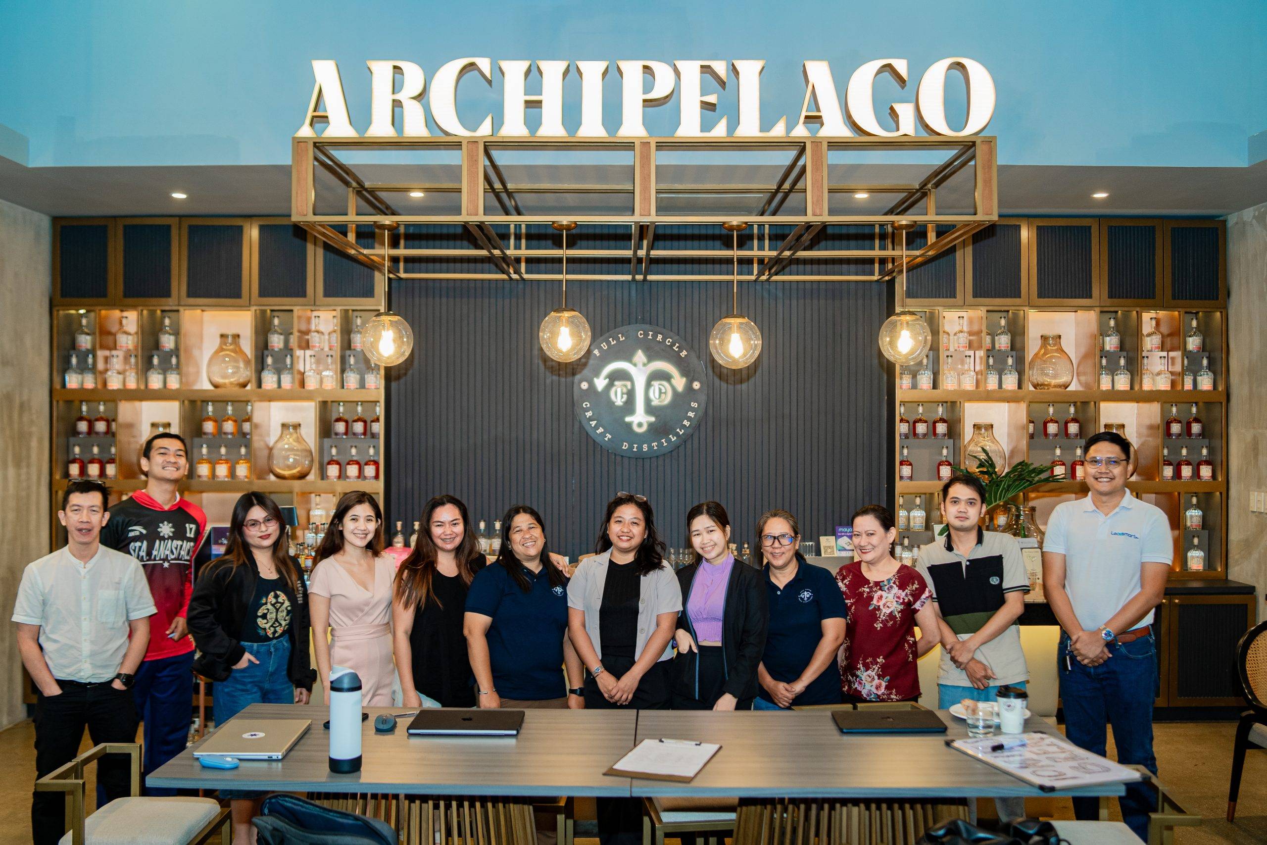 The LeadSmart PH training team and the staff of Full Circle Craft Distiller smile for a group photo after a successful Basic Food Safety Training and GMP workshop in Calamba, Laguna.