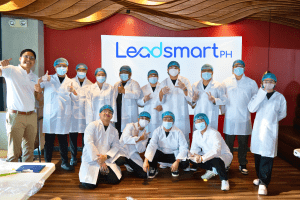 group of participants post for the laboratory gown