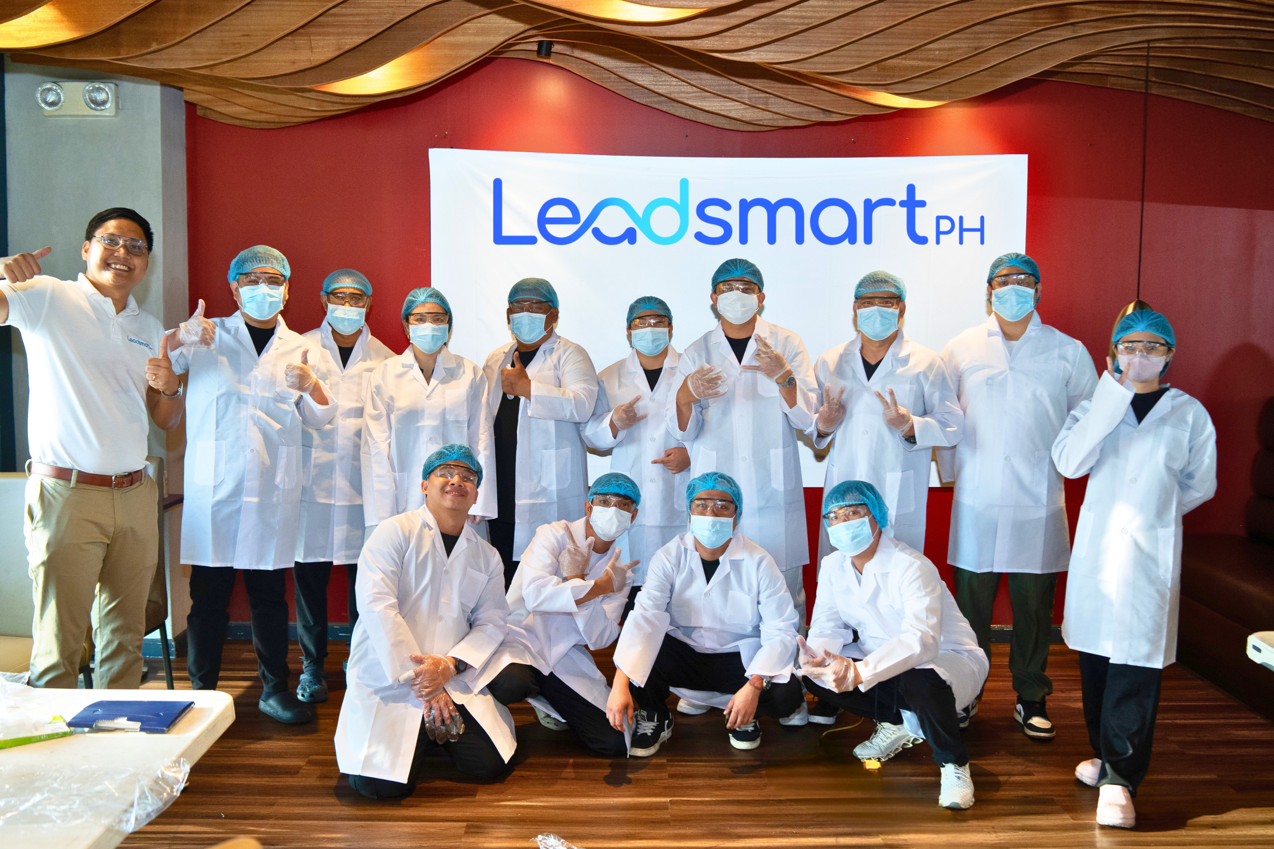 group of participants post for the laboratory gown