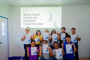 Ms. Jasmine Faith Bernal, RND, and the dietary staff of Western Pangasinan District Hospital proudly displaying their newly earned food hygiene and handling certificate after comprehensive training. New Food Hygiene and Handling Certificate